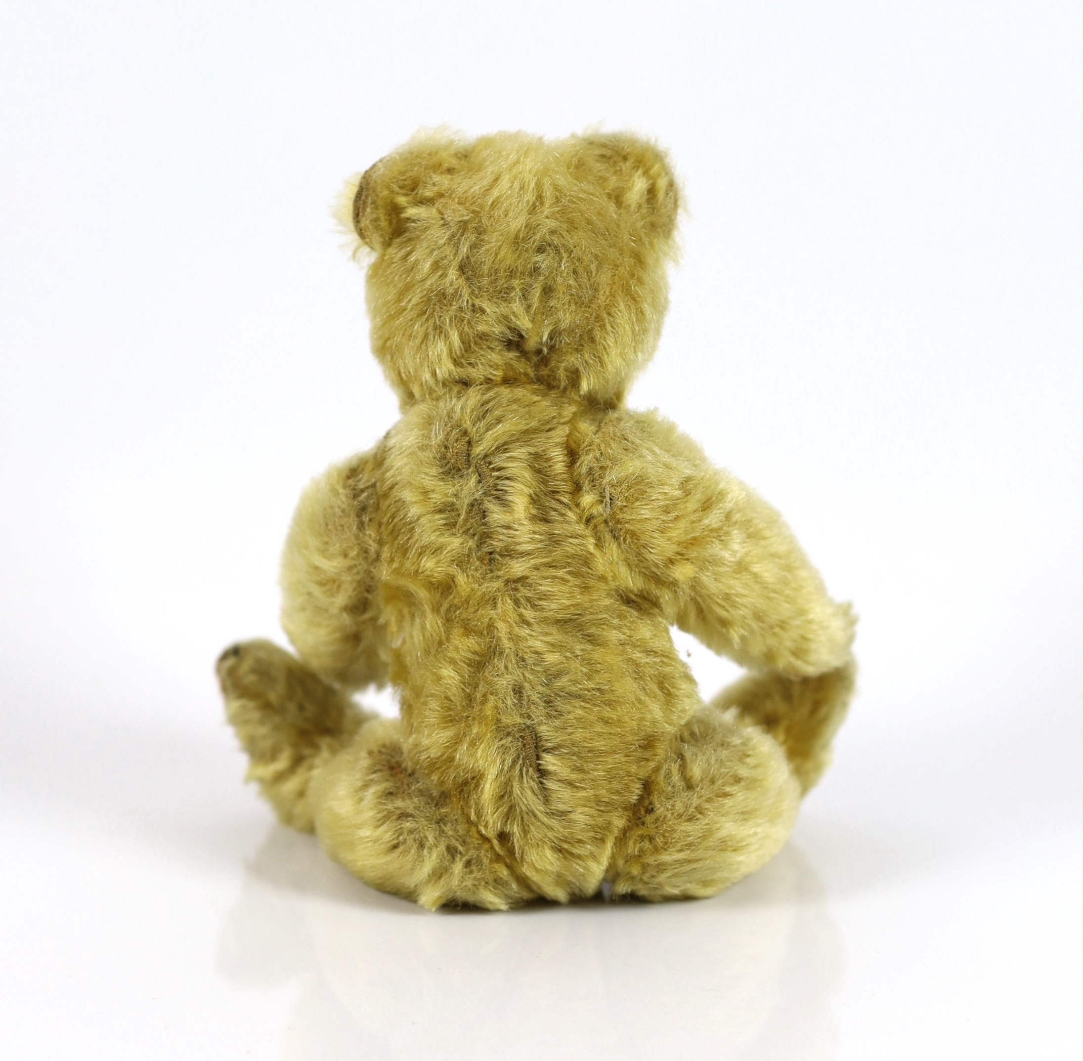 A Farnell bear, c.1920, 25cm, in good condition, paw pads replaced